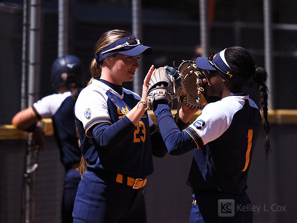 Kacey Zobac (23), Amani Bradley (1)