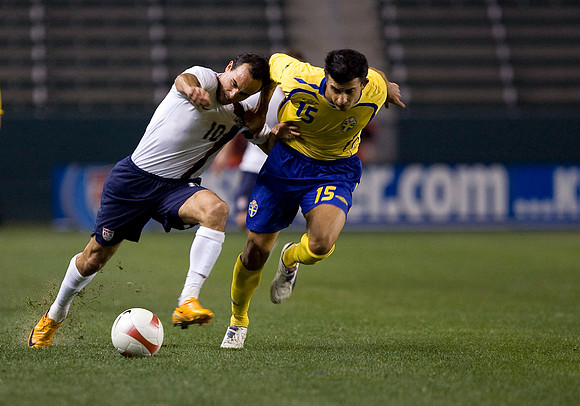 Landon Donovan and Behrang Safari